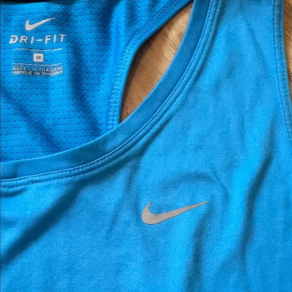 Two Nike Women's Magenta and Sky Blue Tank Tops! 1X